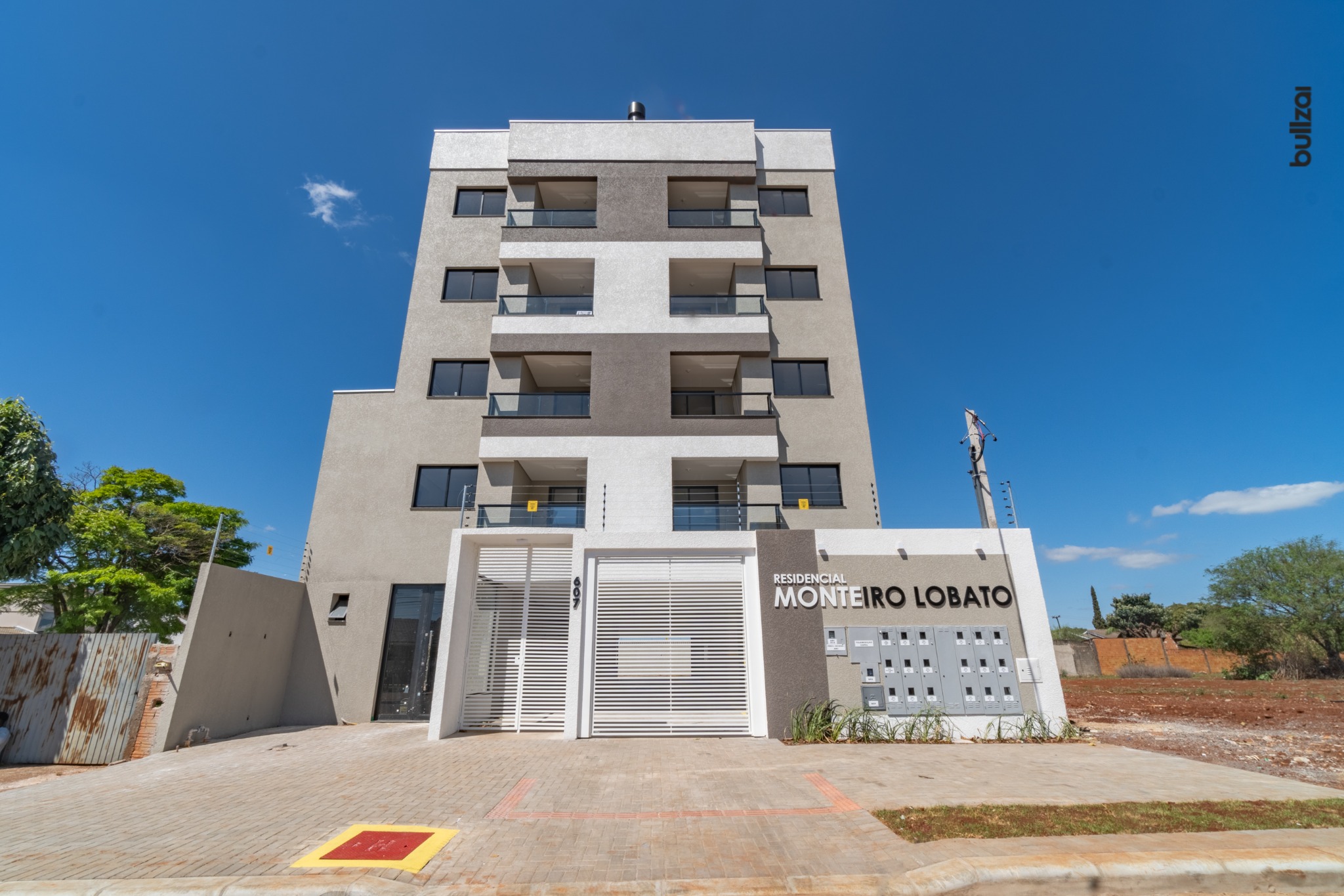 Fachada real do Residencial Monteiro Lobato